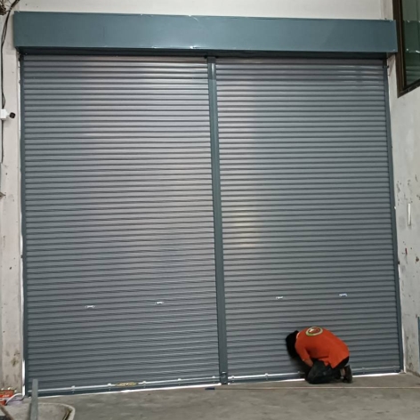 ประตูม้วนระบบมือดึงใช้สปริง